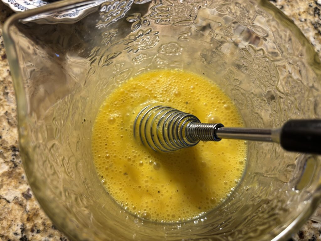 Eggs whisked for scrambled eggs 