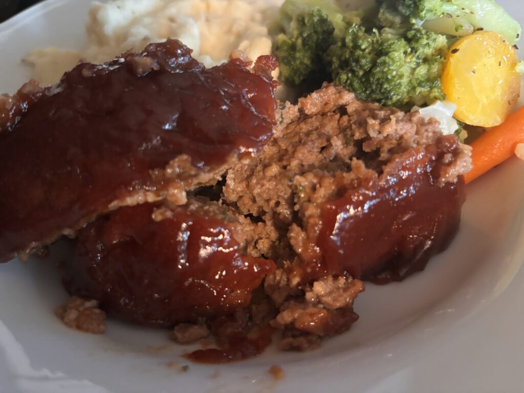 Plated  brown sugar meatloaf dinner 