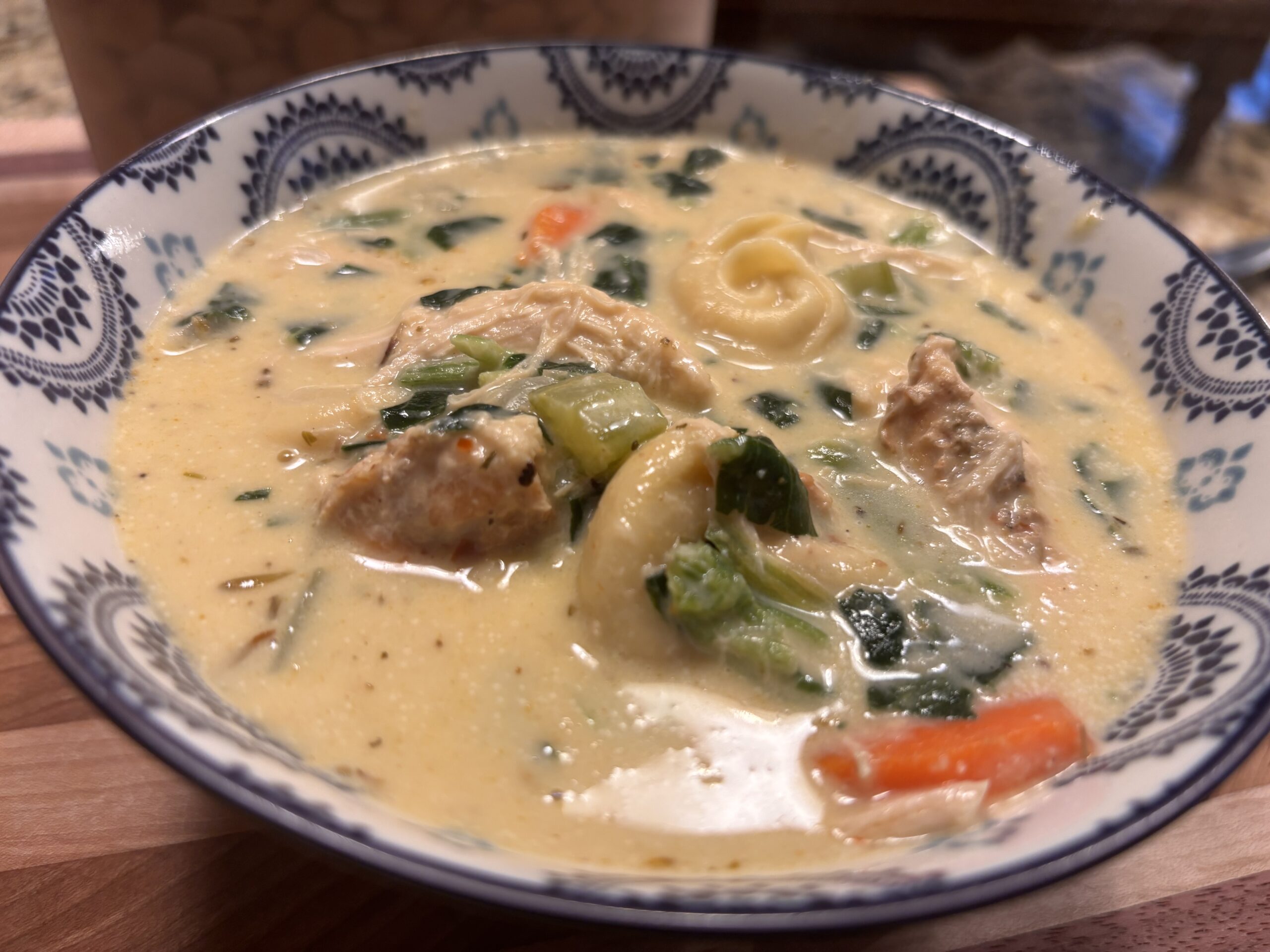 Bowl of creamy chicken tortellini soup